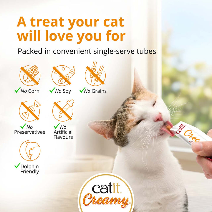 Cat licking a Catit Creamy tube: no corn, no soy, no grains, no preservatives, no artificial flavours